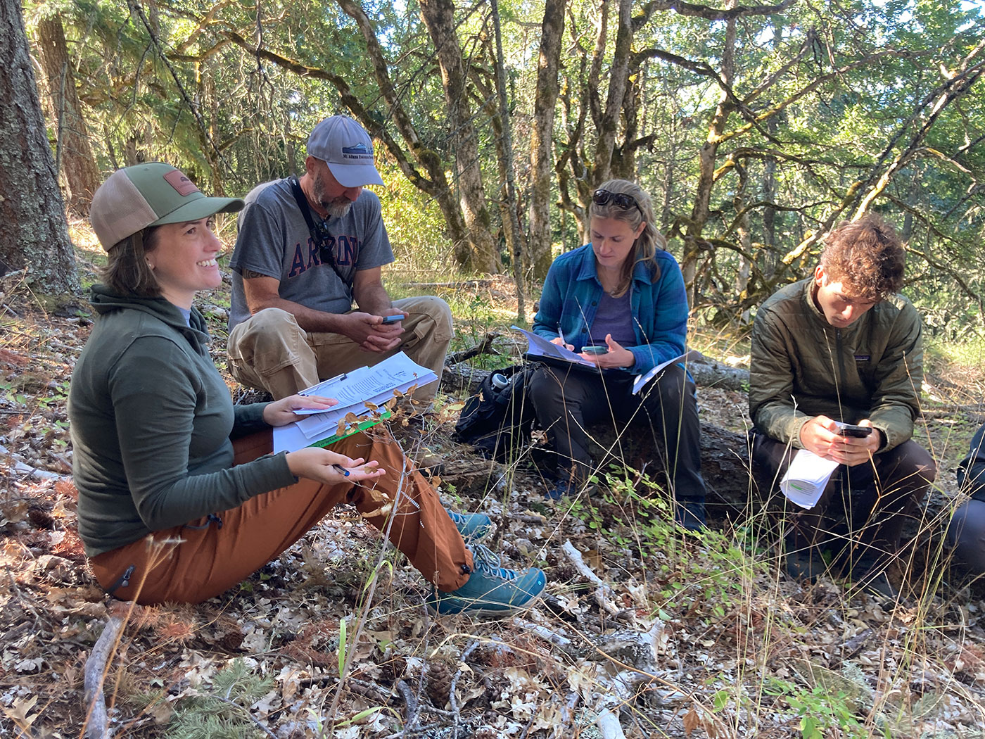 Photo of workers working in the field.